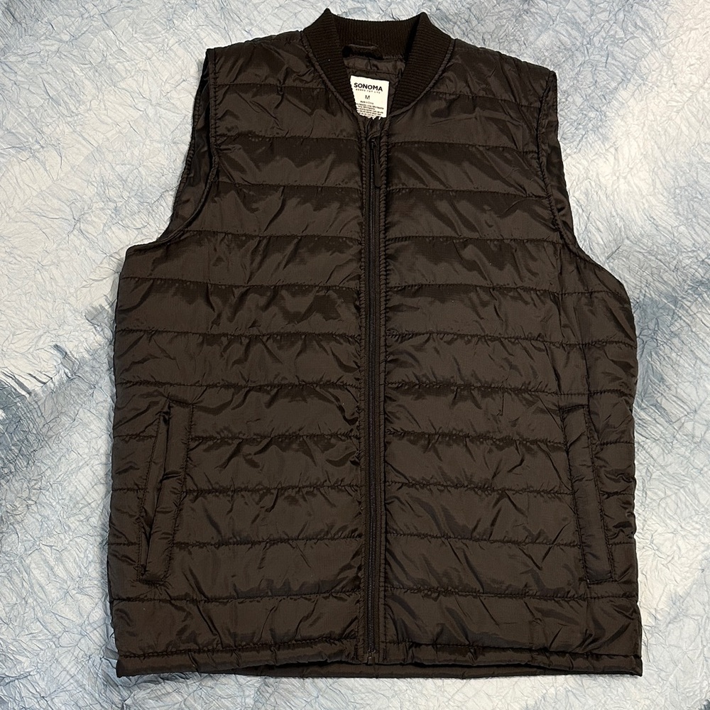 14. Stylish Black Quilted Vest for Men
